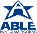 Logo for ABLE, featuring a star and the text "PAINT-GLASS-FLOORING."